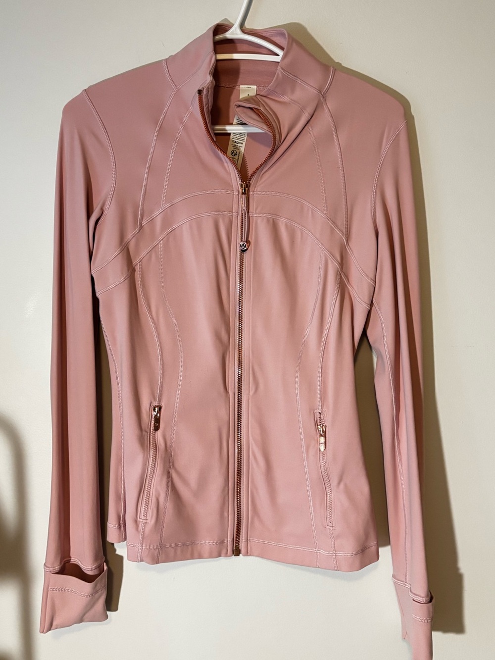 lululemon define jacket in pink haze with rose gold zipper